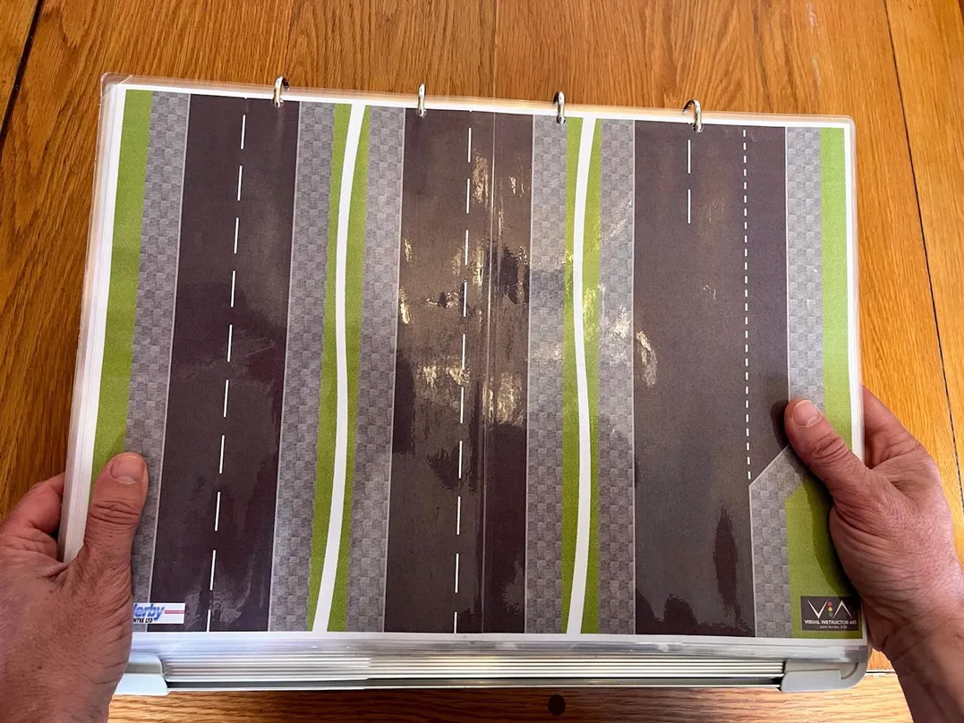 Third 'Compact & Convenient' carousel image showing off the mini V.I.A. kit in-front of the camera.